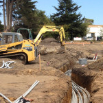 Excavating a conduit trench